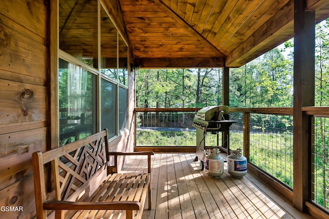 wooden terrace featuring area for grilling