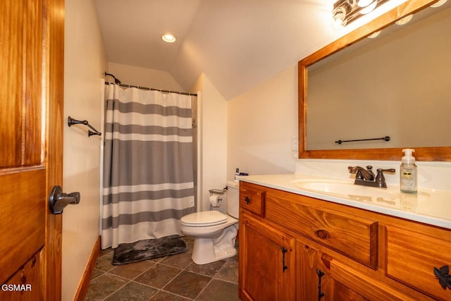 bathroom with toilet, walk in shower, tile patterned floors, vanity, and lofted ceiling