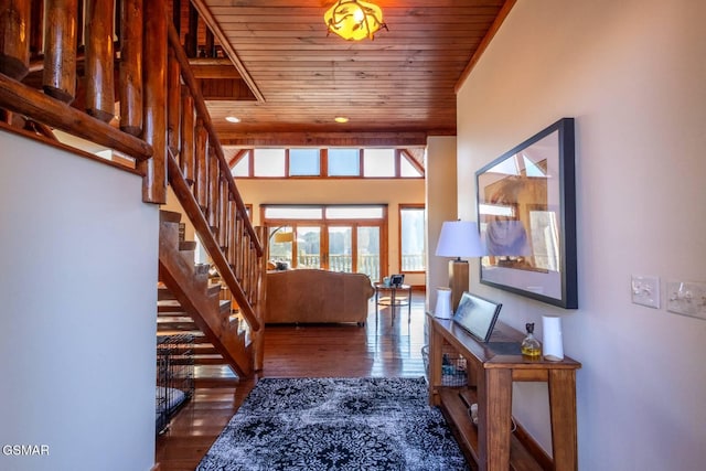 foyer entrance featuring wooden ceiling and dark hardwood / wood-style flooring