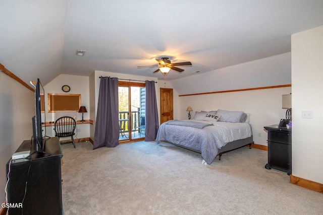 carpeted bedroom featuring ceiling fan, access to exterior, and vaulted ceiling