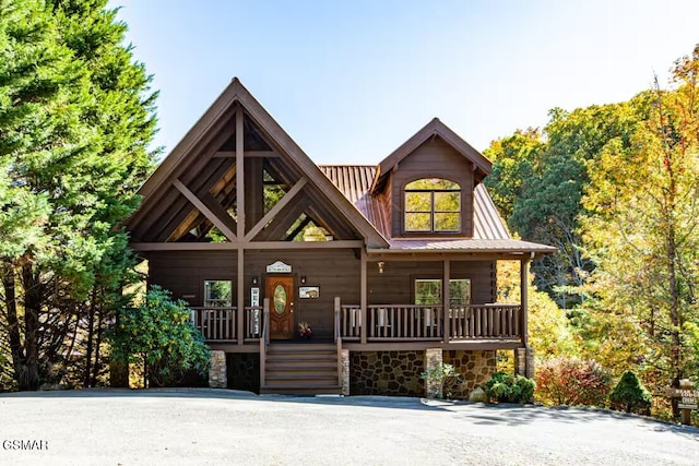 2430 Cobbler Way, Pigeon Forge, TN 37863 - view of front facade with a porch and a metal roof
