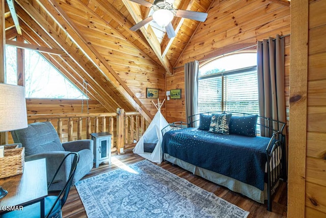 2430 Cobbler Way, Pigeon Forge, TN 37863 - bedroom featuring wood finished floors, high vaulted ceiling, beamed ceiling, and wood walls