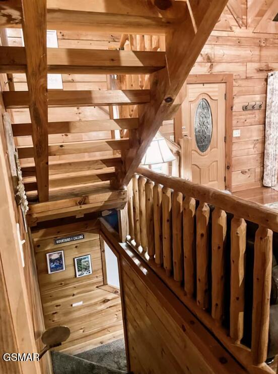 2430 Cobbler Way, Pigeon Forge, TN 37863 - stairs featuring wooden walls and wood finished floors