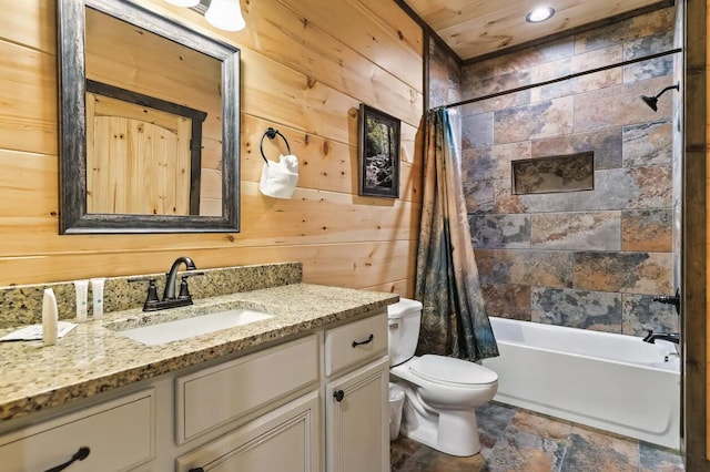 full bathroom featuring vanity, shower / bath combo, wooden walls, toilet, and wood ceiling