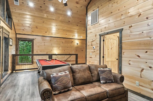 rec room featuring wooden walls, lofted ceiling, and billiards