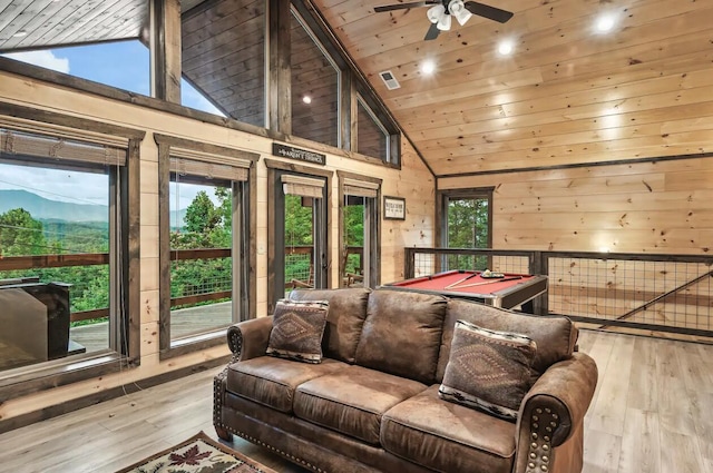 game room with wood ceiling, wood walls, light hardwood / wood-style floors, and billiards