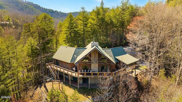 bird's eye view featuring a forest view