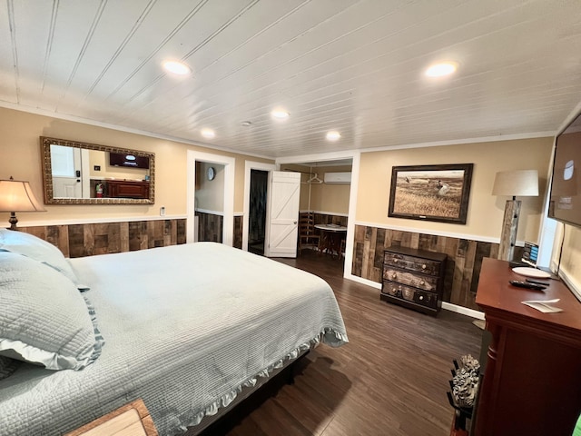 bedroom with dark hardwood / wood-style flooring and crown molding