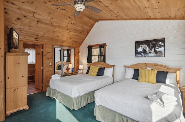 bedroom with wood ceiling, vaulted ceiling, ceiling fan, wooden walls, and carpet floors