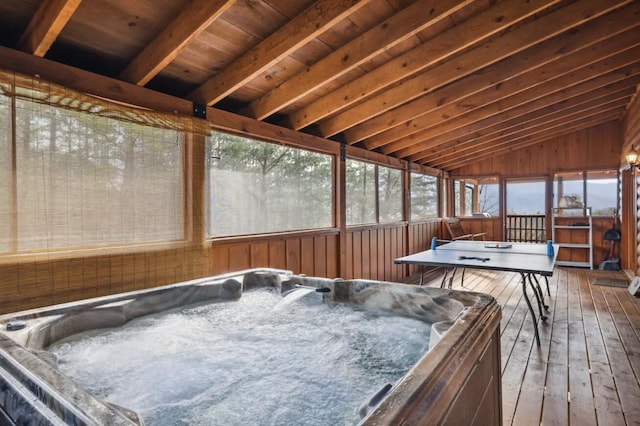 sunroom with lofted ceiling with beams, wooden ceiling, and a hot tub