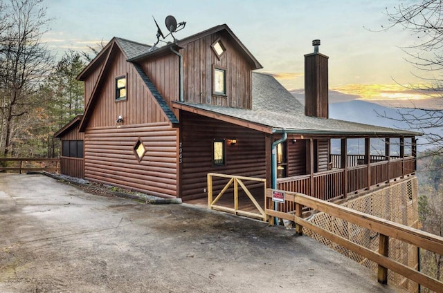 view of property exterior at dusk