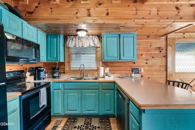 kitchen with wooden walls, sink, blue cabinetry, black appliances, and wooden ceiling