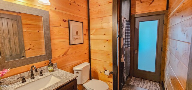 1531 Bear Valley Rd, Sevierville, TN 37876 - bathroom with wood walls and vanity