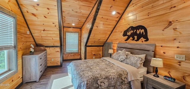 1531 Bear Valley Rd, Sevierville, TN 37876 - bedroom featuring wood finished floors, wood walls, and vaulted ceiling