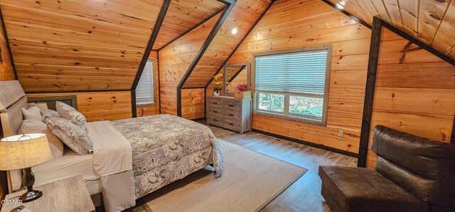 1531 Bear Valley Rd, Sevierville, TN 37876 - bedroom featuring vaulted ceiling, wooden walls, wood ceiling, and wood finished floors
