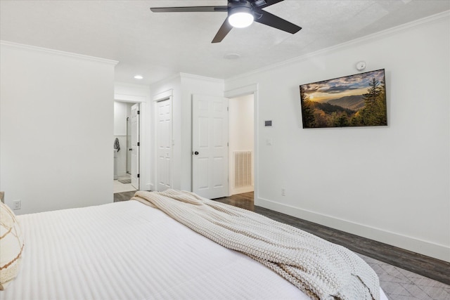 bedroom featuring connected bathroom, ceiling fan, crown molding, and hardwood / wood-style floors