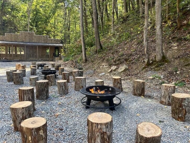 view of patio / terrace featuring a fire pit