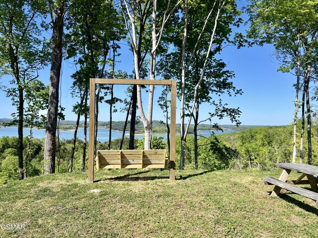 view of yard with a water view