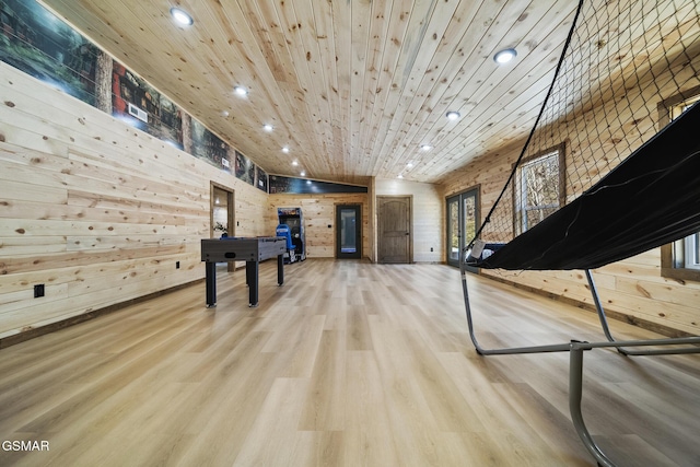 game room featuring recessed lighting, wood finished floors, wooden walls, and wooden ceiling