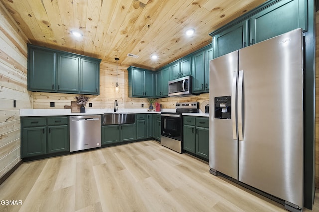 kitchen with wooden ceiling, light wood finished floors, light countertops, and appliances with stainless steel finishes