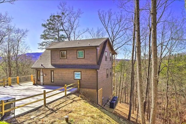 back of property with a patio