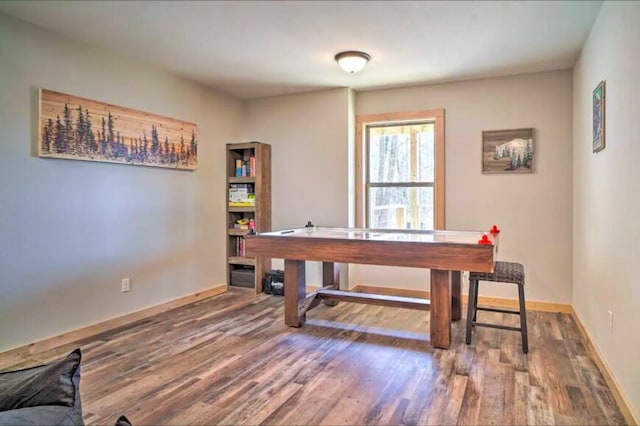 dining area with wood-type flooring