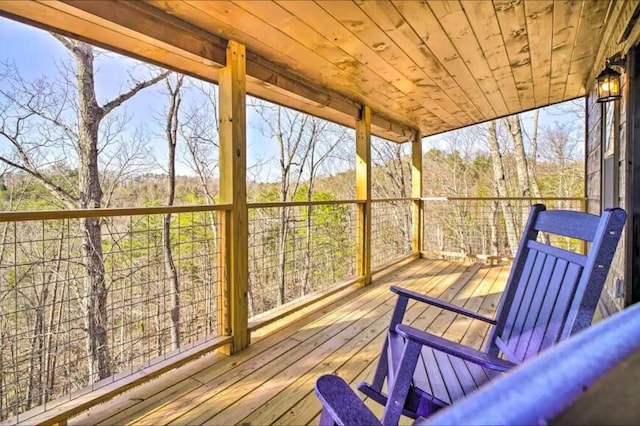 sunroom with wood ceiling