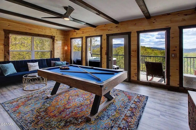 playroom with wooden walls, wood finished floors, and billiards