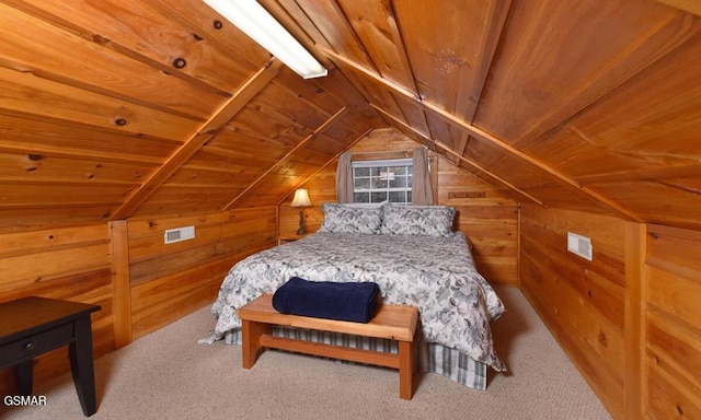 bedroom with lofted ceiling, wooden ceiling, carpet flooring, and wood walls