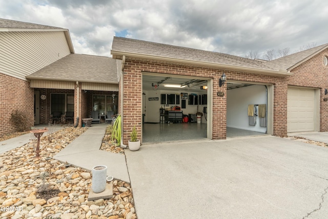 view of patio featuring a garage