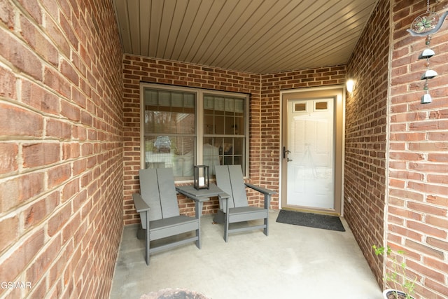 property entrance with a patio area