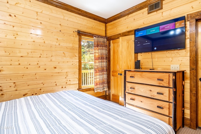 415 Big Bear Way, Pigeon Forge, TN 37863 - bedroom featuring wood walls and crown molding