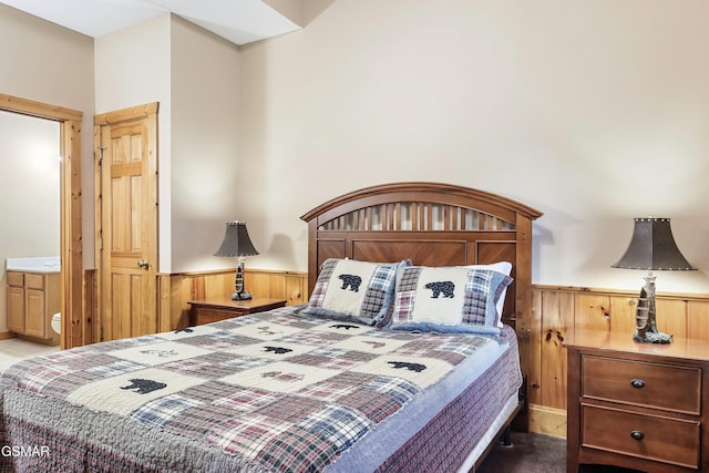 415 Big Bear Way, Pigeon Forge, TN 37863 - carpeted bedroom with a wainscoted wall and wood walls