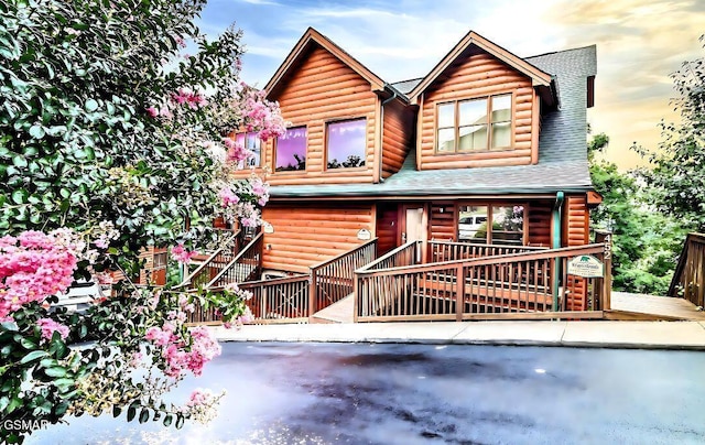 415 Big Bear Way, Pigeon Forge, TN 37863 - view of front of house featuring faux log siding and roof with shingles