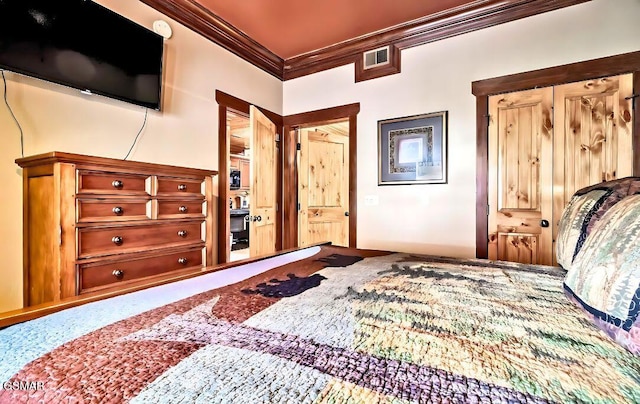 415 Big Bear Way, Pigeon Forge, TN 37863 - bedroom featuring crown molding