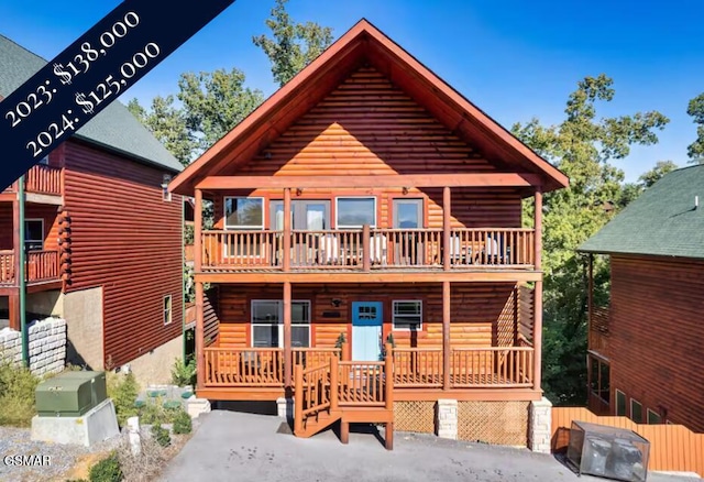 668 Stockton Dr, Sevierville, TN 37876 - log cabin featuring a balcony