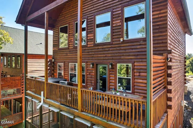668 Stockton Dr, Sevierville, TN 37876 - back of property with a wooden deck and faux log siding