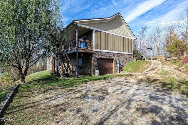 view of side of property with a garage