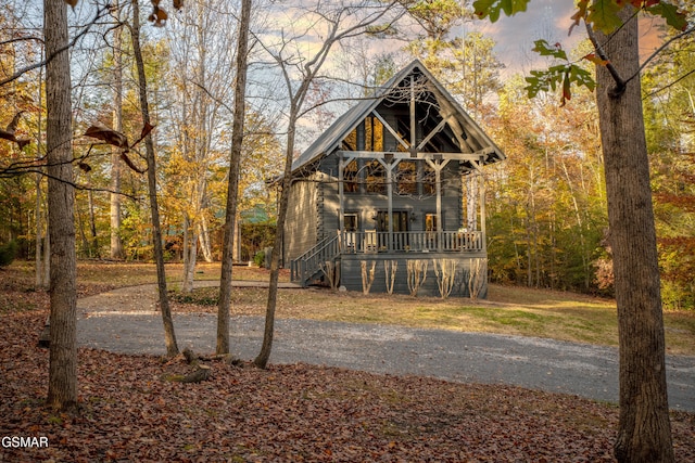 view of front of house featuring a porch and stairway