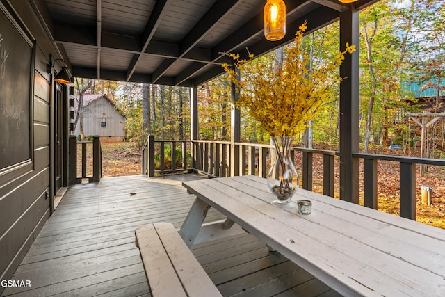 deck with outdoor dining space