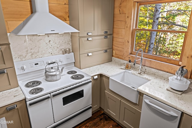 kitchen with white appliances, light stone counters, extractor fan, gray cabinetry, and a sink