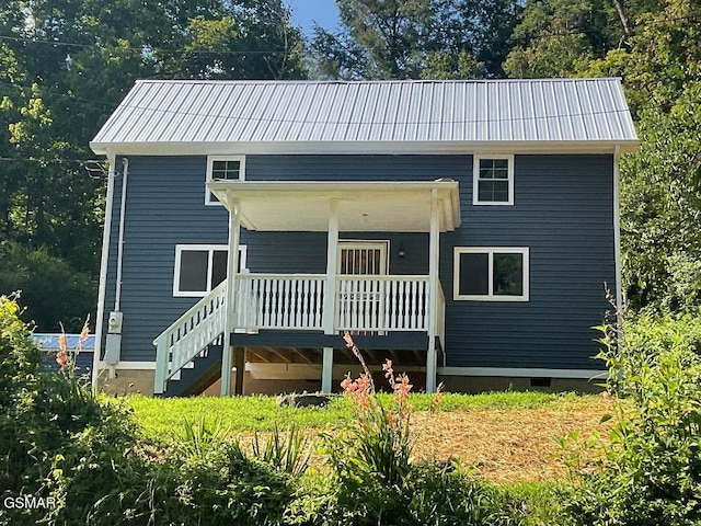 3979 Wilhite Rd, Sevierville, TN 37876 - view of front facade with stairway and a metal roof