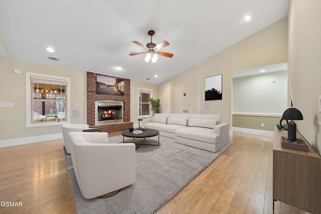 225 Piney Rd, Kodak, TN 37764 - living area featuring ceiling fan, lofted ceiling, visible vents, and light wood-style flooring