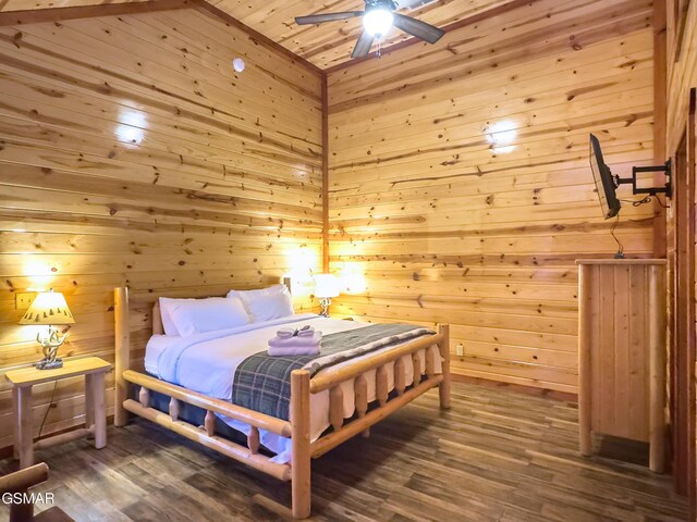 2316 Boulder Way, Sevierville, TN 37862 - bedroom with dark wood finished floors, wooden walls, a ceiling fan, and wood ceiling