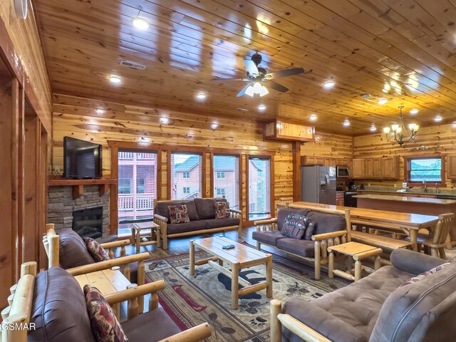 2316 Boulder Way, Sevierville, TN 37862 - living room with wooden ceiling, light wood-style floors, plenty of natural light, a chandelier, and recessed lighting
