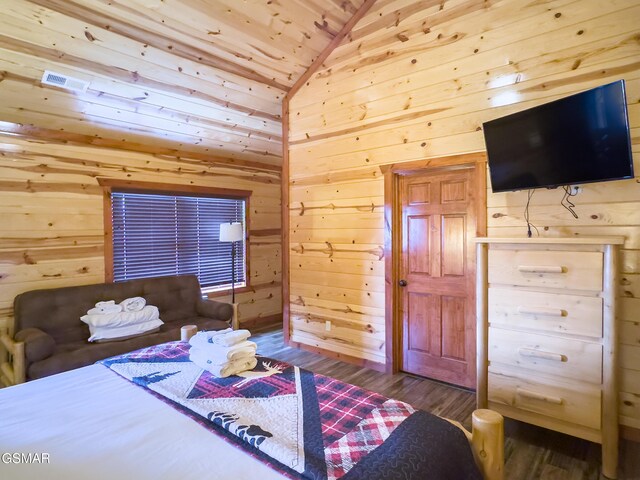 2316 Boulder Way, Sevierville, TN 37862 - bedroom featuring wood walls, lofted ceiling, wood finished floors, and wooden ceiling