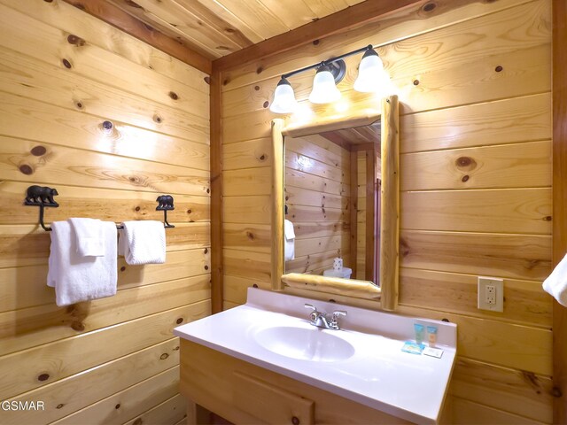 2316 Boulder Way, Sevierville, TN 37862 - bathroom with wood walls, wooden ceiling, and vanity