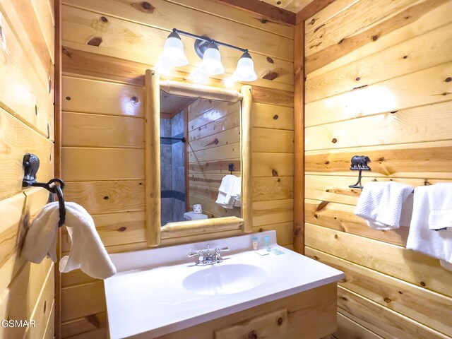 2316 Boulder Way, Sevierville, TN 37862 - bathroom with wooden walls and vanity