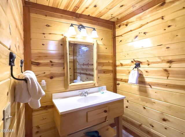 2316 Boulder Way, Sevierville, TN 37862 - bathroom featuring wooden walls, vanity, and wooden ceiling