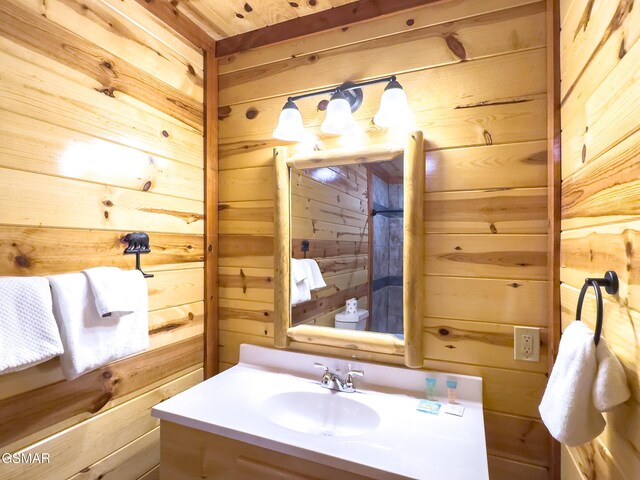 2316 Boulder Way, Sevierville, TN 37862 - bathroom featuring wooden walls and vanity
